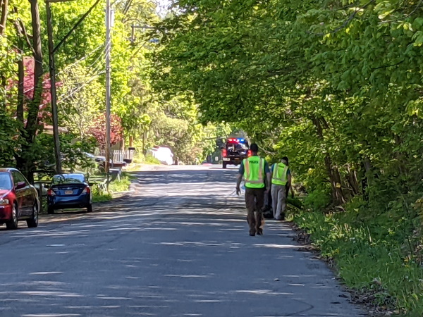 Ithaca Police Department members assisting with clean up